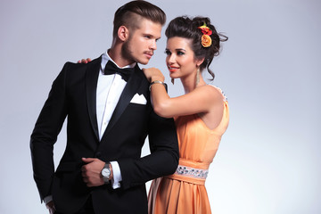 fashion couple with woman behind man