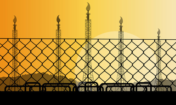 Wired fence and oil refinery industrial factory desert landscape