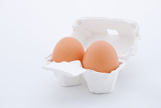 Two Eggs in white tray