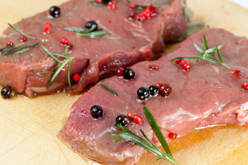 Raw beef on cutting board