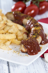 Portion of Currywurst