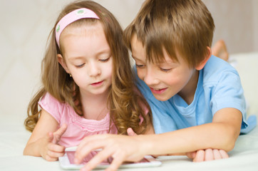 children using tablet computer