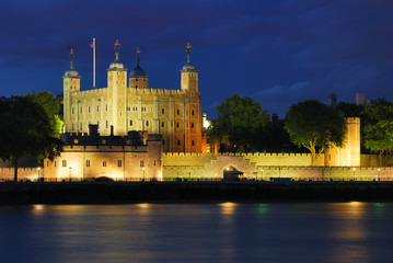 Fototapeta na wymiar Tower of London illuminated at summer night