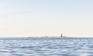 Ancient lighthouse on an island © RistoH