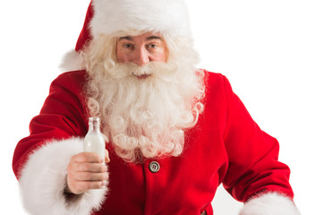 Santa Claus drinking milk from bottle