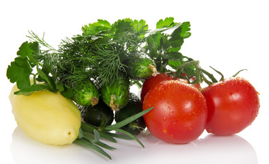 Tomatoes, cucumbers, pepper, parsley isolated on white