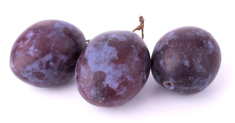 Plums isolated on white background