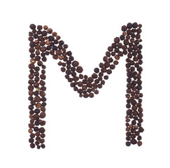 letter M made of grains of pepper