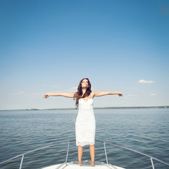 Fototapeta na wymiar happy woman smiling on boat