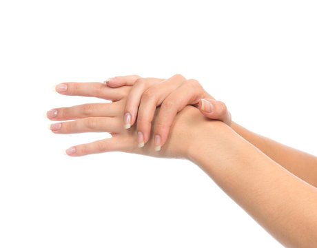 Healthy young woman hands with french manicure nails