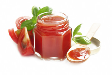 Fresh tomato sauce with basil isolated on white