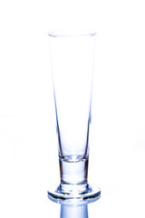 water pouring in a glass on white background.