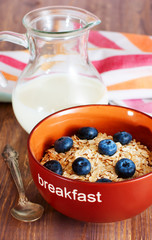 Healthy breakfast with bowl of oat flakes
