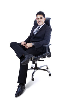 Asian Business Man Sitting On Office Chair