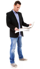Businessman reading a newspaper isolated