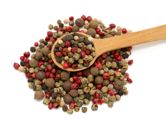 Peppercorn mix in a wooden spoon