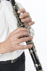 Fototapeta premium Hands of man playing clarinet