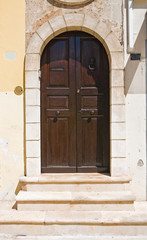 Wooden door. Manduria. Puglia. Italy.