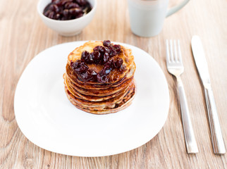Delicious pancakes with cherry jam