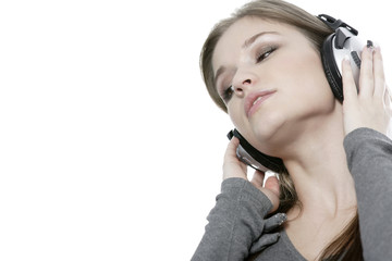 Woman listening to music on headphones