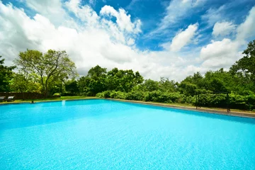 Papier Peint photo Turquoise Infinity swimming pool in beautiful landscape
