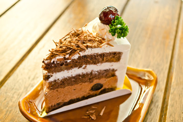 tasty chocolate cake on table