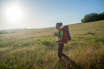 Happy smiling woman in field