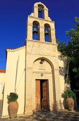 Fototapeta na wymiar Church in village Panormo at Crete, Greece