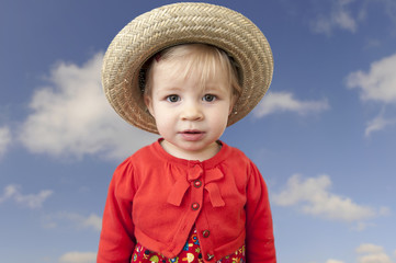 little toddler with summer straw hat