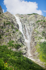Waterfall high in Caucasus mountains in Georgia