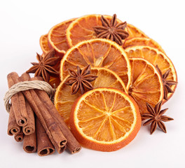 dried orange sliced with cinnamon and star anise