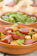 Chorizo & Bread and Padron Peppers Tapas - Spanish tapas dishes.