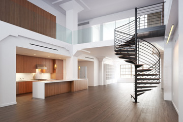 Empty room of residence with a spiral staircase