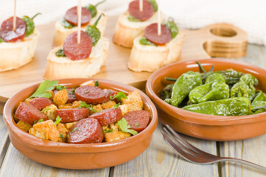 Chorizo & Bread and Padron Peppers Tapas - Spanish tapas dishes.