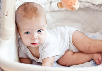 resting baby in the bed