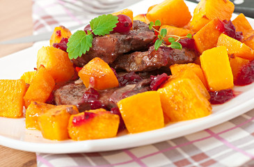 Baked pumpkin with meat and vegetables.