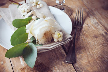 Vintage table setting with floral decorations