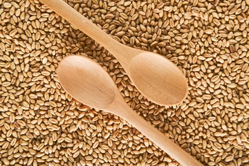 Fotobehang Wood spoons and wheat grains © Bits and Splits