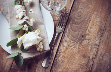 Vintage table setting with floral decorations