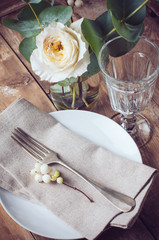Vintage table setting with floral decorations