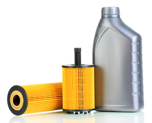 Car oil filters and motor oil can isolated on white