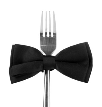 Black Bow Tie  On Fork, Isolated On White