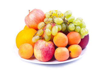 Plate of a tasty fruits isolated on a white background.