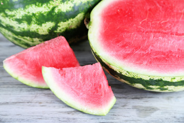 Ripe watermelons on wooden table