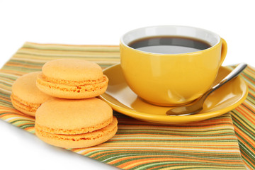 Coffee and macaroons isolated on white