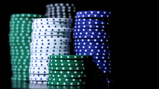 Poker chips stacking.