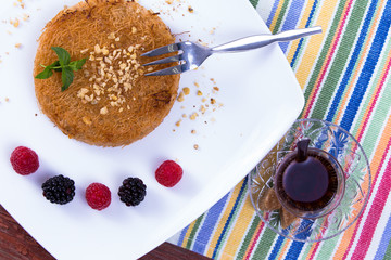 Kunefe and Turkish hot Tea on a Picnic Table