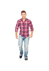 Fototapeta premium Casual boy with plaid shirt walking