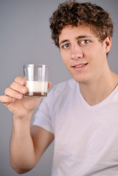 young Men smiling with Milk