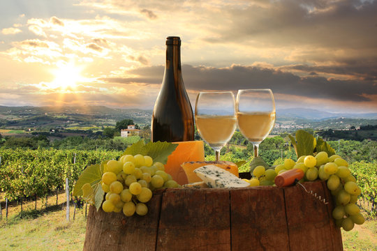 White wine with barell  in vineyard, Chianti, Tuscany, Italy